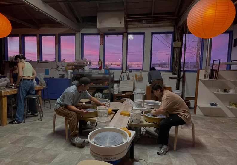 Artists work at potter's wheels in Safariii Camp. (Photo: Itai Renat)