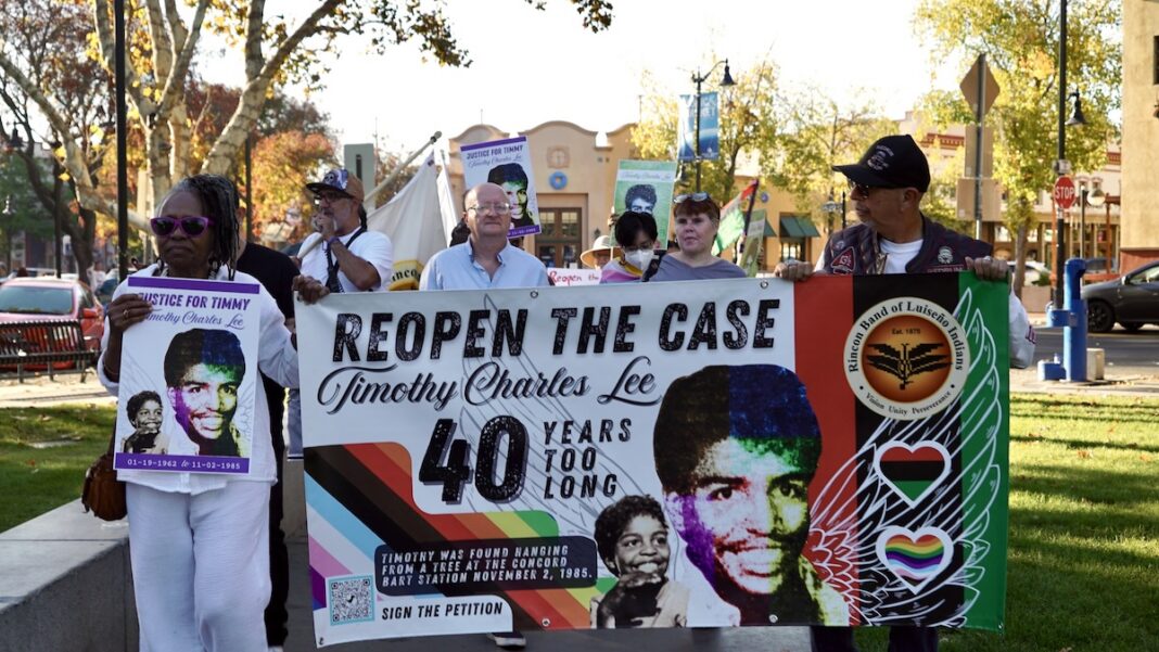 Marchers carry a poster demanding justice for Timothy Charles Lee during the 2025 Justice for Timothy march in Concord, Calif. (Credit Maria Judice)